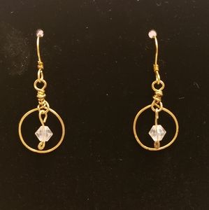 Small gold colored wire wrapped dangles